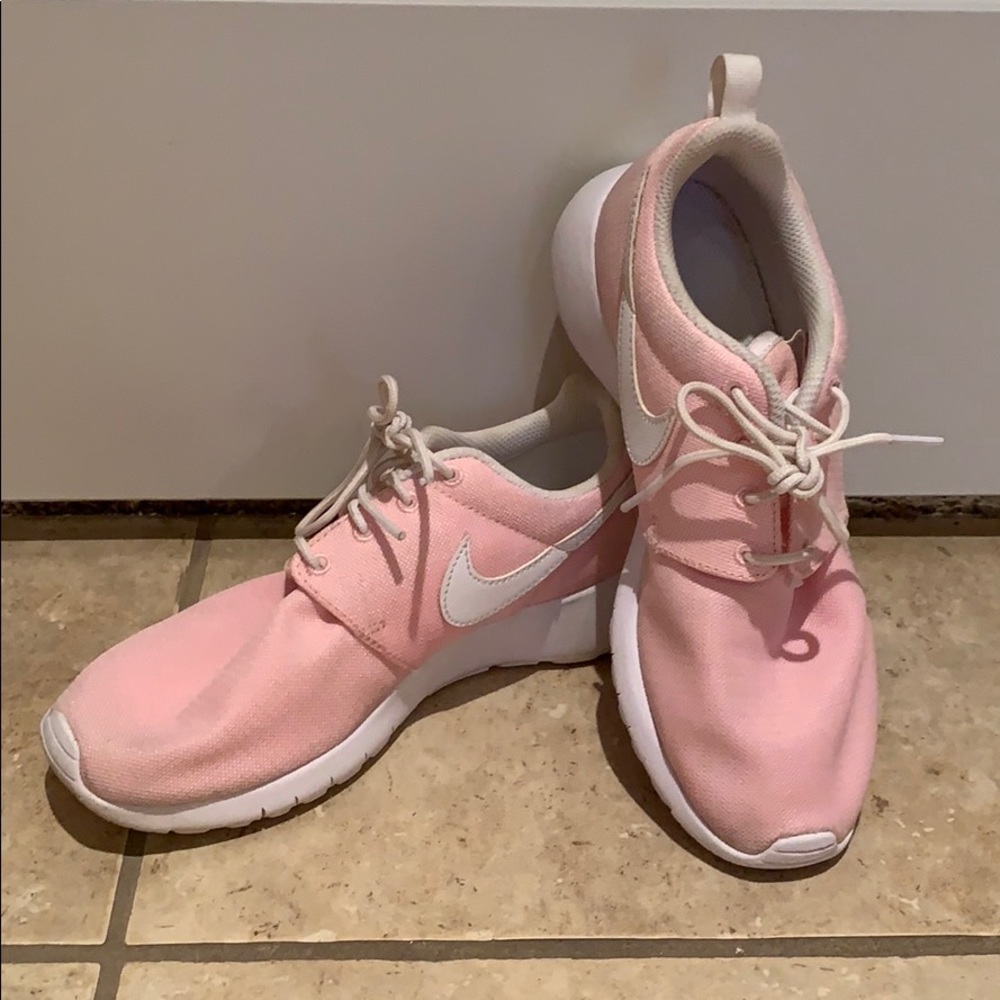 Woman’s Pink Nike Shoes
